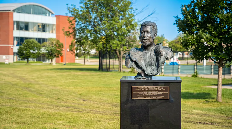 A memorial bust in a Maywood park